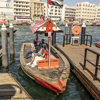 Buy canvas prints of Water taxi on Dubai creek. by Chris North
