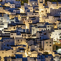 Buy canvas prints of Casares townhouses at night, Andalusia Spain. by Chris North