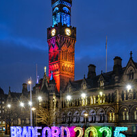Buy canvas prints of Bradford town hall by night, featuring the 2025 logo by Chris North