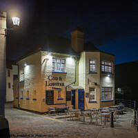 Buy canvas prints of The Cod and Lobster pub in Staithes. by Chris North