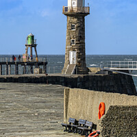 Buy canvas prints of Whitby historic harbour entrance. by Chris North