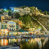 Buy canvas prints of Symi Harbour at night. by Chris North