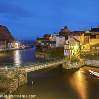 Buy canvas prints of Staithes at dusk. by Chris North