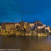 Buy canvas prints of Staithes harbour at flood tide. by Chris North