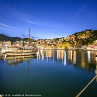 Buy canvas prints of Symi Harbour at night. by Chris North