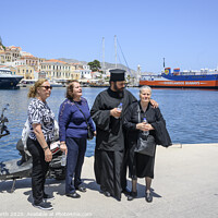 Buy canvas prints of Greek orthodox priest with parishioners. by Chris North