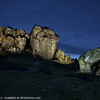 Buy canvas prints of Cow and calf rocks at dusk. by Chris North