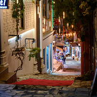Buy canvas prints of Backstreet Kalkan by night, Turkey. by Chris North