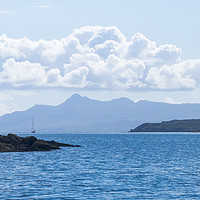 Buy canvas prints of Sailboat and the Isle Of Rum by Maarten D'Haese