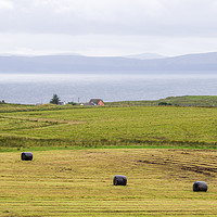 Buy canvas prints of Remote House and Hay Bales on the Isle Of Skye by Maarten D'Haese