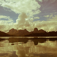 Buy canvas prints of Clouds reflecting in lake on a hazy day by  