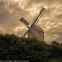 Buy canvas prints of Windmill and stormy sky by Graeme Hutson