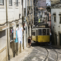 Buy canvas prints of Lisbon's Iconic Tram No.28 Journey by Steven Dale
