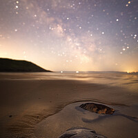 Buy canvas prints of Beach Rocks under the Night Sky by Karl McCarthy
