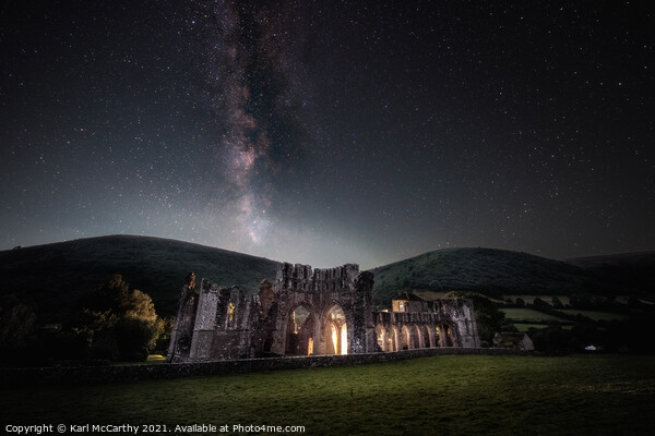 Night time glow of Llanthony Priory Picture Board by Karl McCarthy