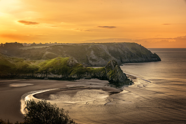 Golden Sunrise at Three Cliffs Bay Picture Board by Karl McCarthy