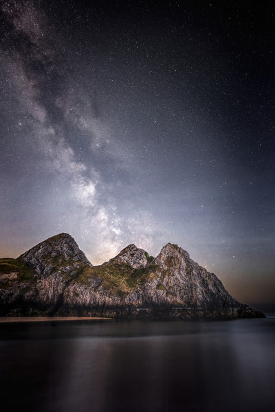 MilkyWay towering above Three Cliffs Picture Board by Karl McCarthy