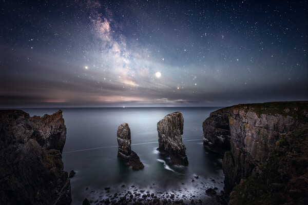 Night sky above the Elegug Stacks - Pembrokeshire Picture Board by Karl McCarthy