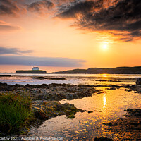 Buy canvas prints of Sunset at St Cwyfan’s Church by Karl McCarthy
