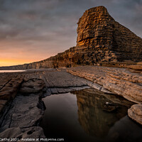 Buy canvas prints of Nash Point Sunset Reflection by Karl McCarthy