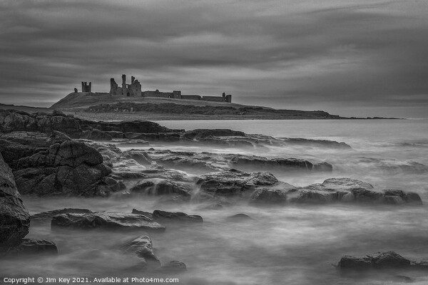 Dunstanburgh Castle Northumberland Black and White Picture Board by Jim Key