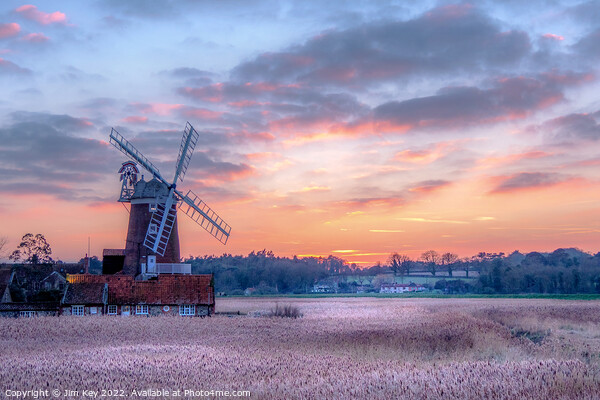 A Glowing Sunset over Cley Windmill Picture Board by Jim Key