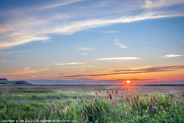 Sunset at Salthouse Norfolk  Picture Board by Jim Key