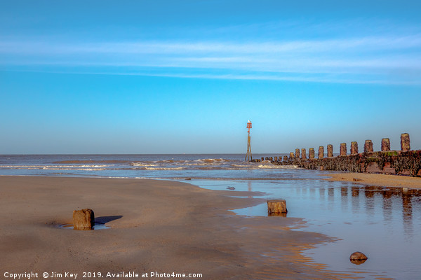 Cromer Beach Groynes on a Sunny Day Picture Board by Jim Key