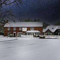 Buy canvas prints of Snow and Star Covered Pub and Restaurant by Dave Williams
