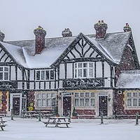 Buy canvas prints of The Dog & Partridge Pub in the Snow by Dave Williams