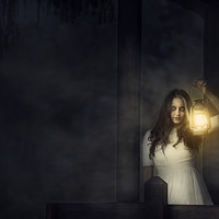 Buy canvas prints of Scary woman with lantern in night scene by Daniela Simona Temneanu