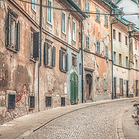 Buy canvas prints of Old street alley in Ljubljana by Daniela Simona Temneanu