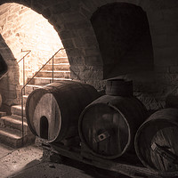 Buy canvas prints of Old wine cellar with wooden barrels and stone stai by Daniela Simona Temneanu