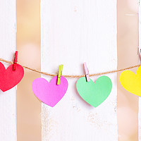 Buy canvas prints of Multicolored hearts tied on a string by Daniela Simona Temneanu