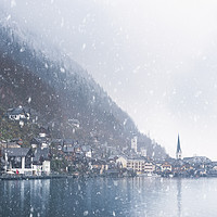 Buy canvas prints of Austrian mountain town under snowfall by Daniela Simona Temneanu