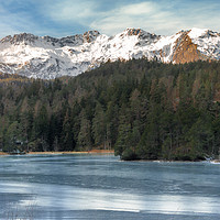Buy canvas prints of Frozen lake and snow-capped mountains by Daniela Simona Temneanu
