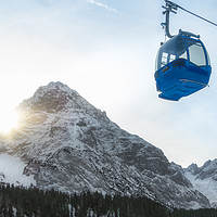 Buy canvas prints of Cable car and snow-capped mountains by Daniela Simona Temneanu