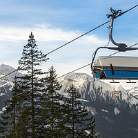 Buy canvas prints of Ski chairlift  and Alps mountains peaks by Daniela Simona Temneanu