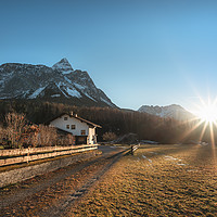 Buy canvas prints of Winter sunshine over Austrian Alps and village by Daniela Simona Temneanu