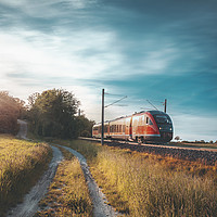 Buy canvas prints of High-speed train moving through nature at sunset by Daniela Simona Temneanu