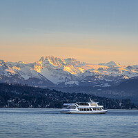 Buy canvas prints of Zurich lake and swiss alps at sunset by Daniela Simona Temneanu