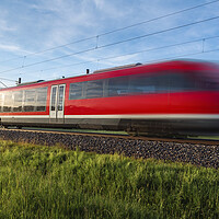 Buy canvas prints of High-speed german train traveling through nature. Summer travel by Daniela Simona Temneanu