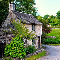 Buy canvas prints of A charming small cottage in the beautiful  Cotswol by Steve Painter