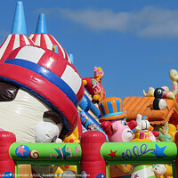Buy canvas prints of Bouncy Castle on a Sunny Day in Paignton by Elizabeth Chisholm