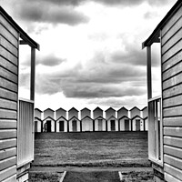 Buy canvas prints of Beach huts at the end of the season - Black and Wh by Elizabeth Chisholm