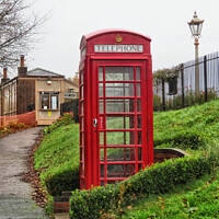 Buy canvas prints of Red Telephone Box outside South Devon Railway Station by Elizabeth Chisholm