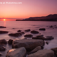 Buy canvas prints of Kimmeridge Bay Sunset (panoramic) by Derek Daniel