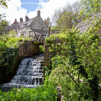 Buy canvas prints of Weir / Waterfall in Corfe Castle Village, Dorset, UK by Derek Daniel