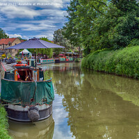 Buy canvas prints of Narrowboats Reflecting In The Canal by Derek Daniel