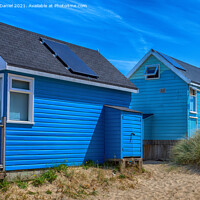 Buy canvas prints of Blue Beach Huts by Derek Daniel